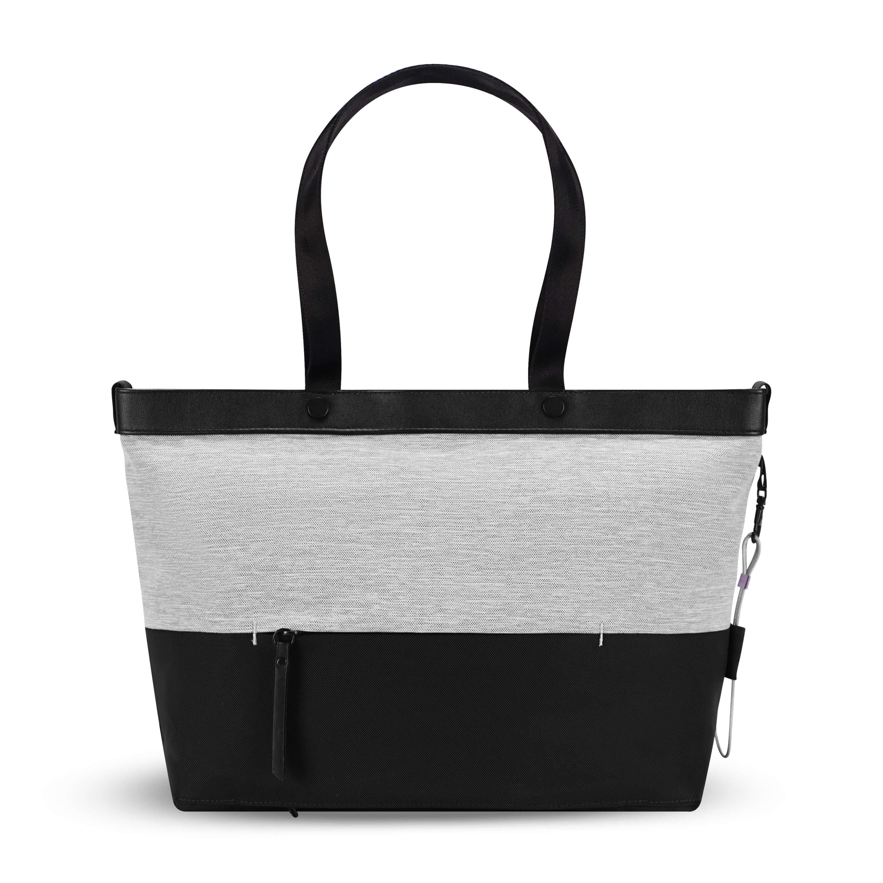 Back view of Sherpani&#39;s Anti-Theft tote, the Cali AT in Sterling, with vegan leather accents in black. There is a zipper compartment that acts as a luggage pass-through or trolley sleve, and a chair loop lock on one side that is secured by an elastic tab.