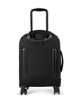 Flat view of the back of Sherpani’s Anti-Theft luggage, the Latitude. The back of the suitcase is black and has vegan leather accents in black. On the top of the suitcase sits a retractable luggage handle. On the side sits an easy-access handle. At the bottom are four 360-degree spinner wheels for smooth rolling.
