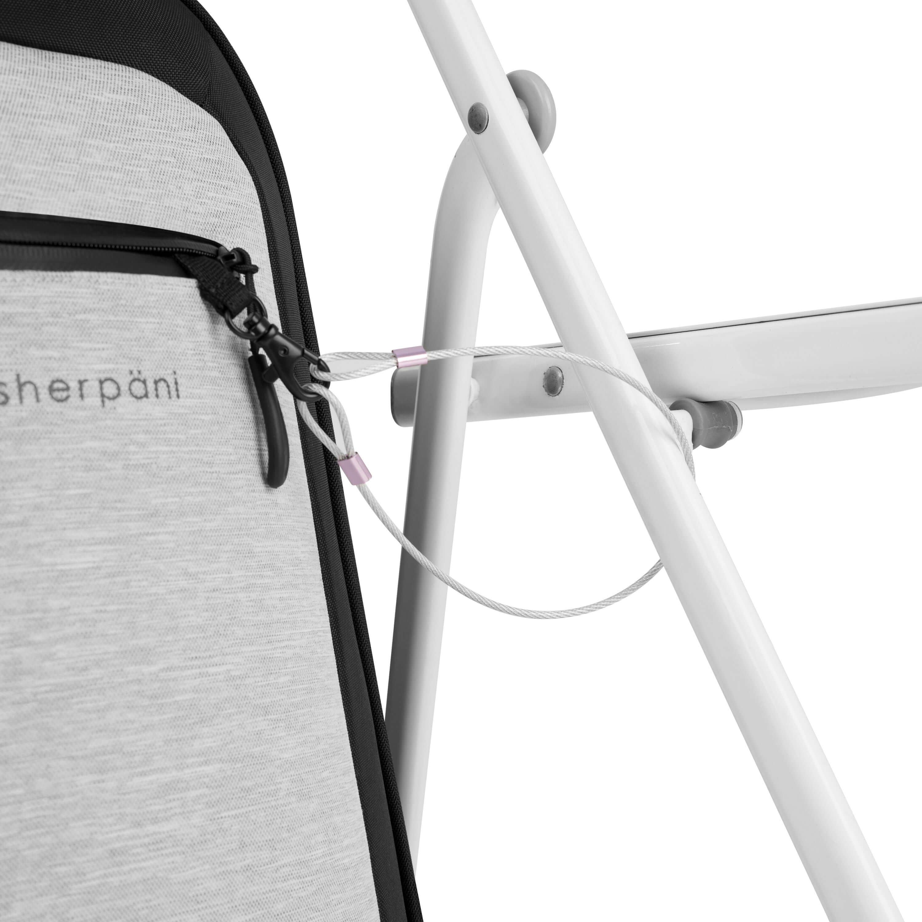Close up view of the chair loop lock system securing Sherpani&#39;s Anti-Theft luggage, the Latitude in Sterling, to a chair.