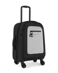 Angled front view of Sherpani’s Anti-Theft luggage the Latitude in Sterling. The suitcase has a soft shell exterior made from recycled plastic bottles and features vegan leather accents in black. There is a main zipper compartment, an expansion zipper and an external pocket on the front with a locking zipper and a ReturnMe tag. On the top of the suitcase sits a retractable luggage handle. On the side sits an easy-access handle. At the bottom are four 360-degree spinner wheels for smooth rolling.