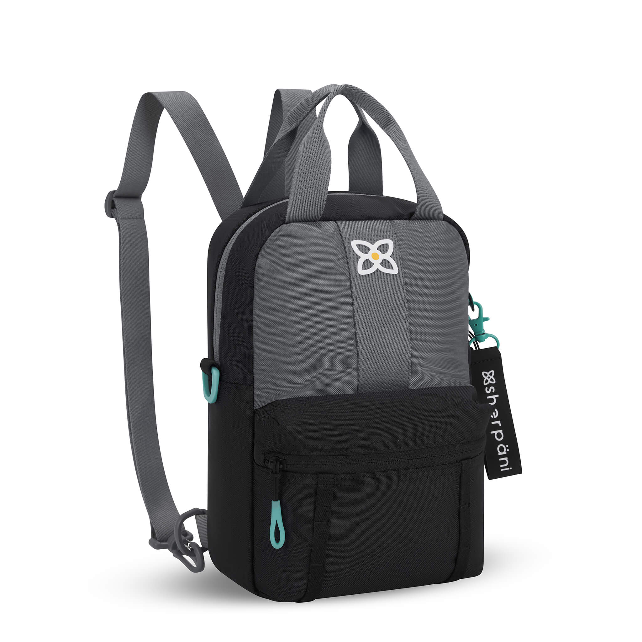 Angled front view of Sherpani mini backpack the Logan in Moonstone. The bag is black and gray with aqua accents. The Logan has fixed tote handles and adjustable backpack straps.