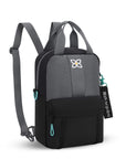 Angled front view of Sherpani mini backpack the Logan in Moonstone. The bag is black and gray with aqua accents. The Logan has fixed tote handles and adjustable backpack straps.
