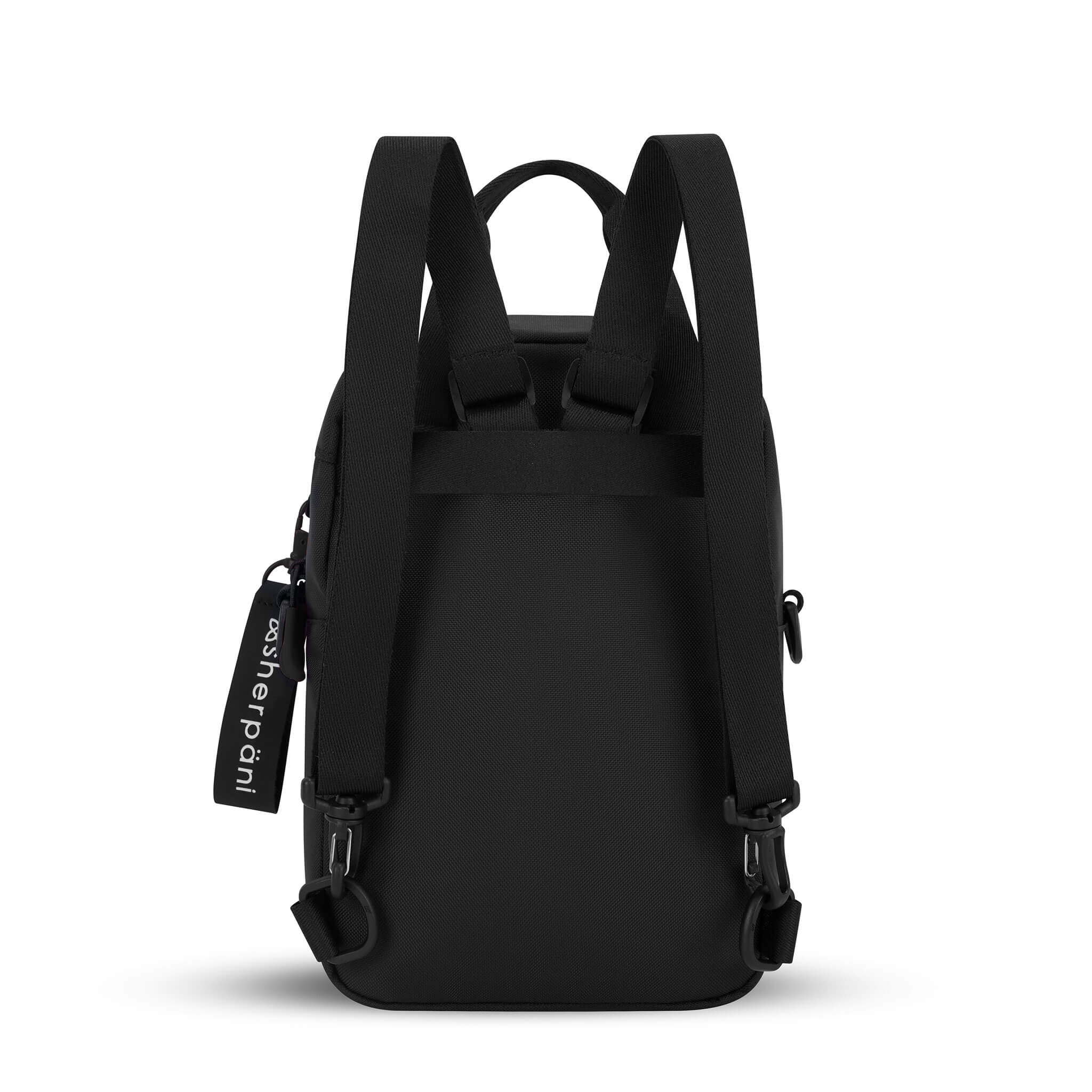 Back view of Sherpani mini backpack the Logan in Raven. The Logan has fixed tote handles and adjustable backpack straps.