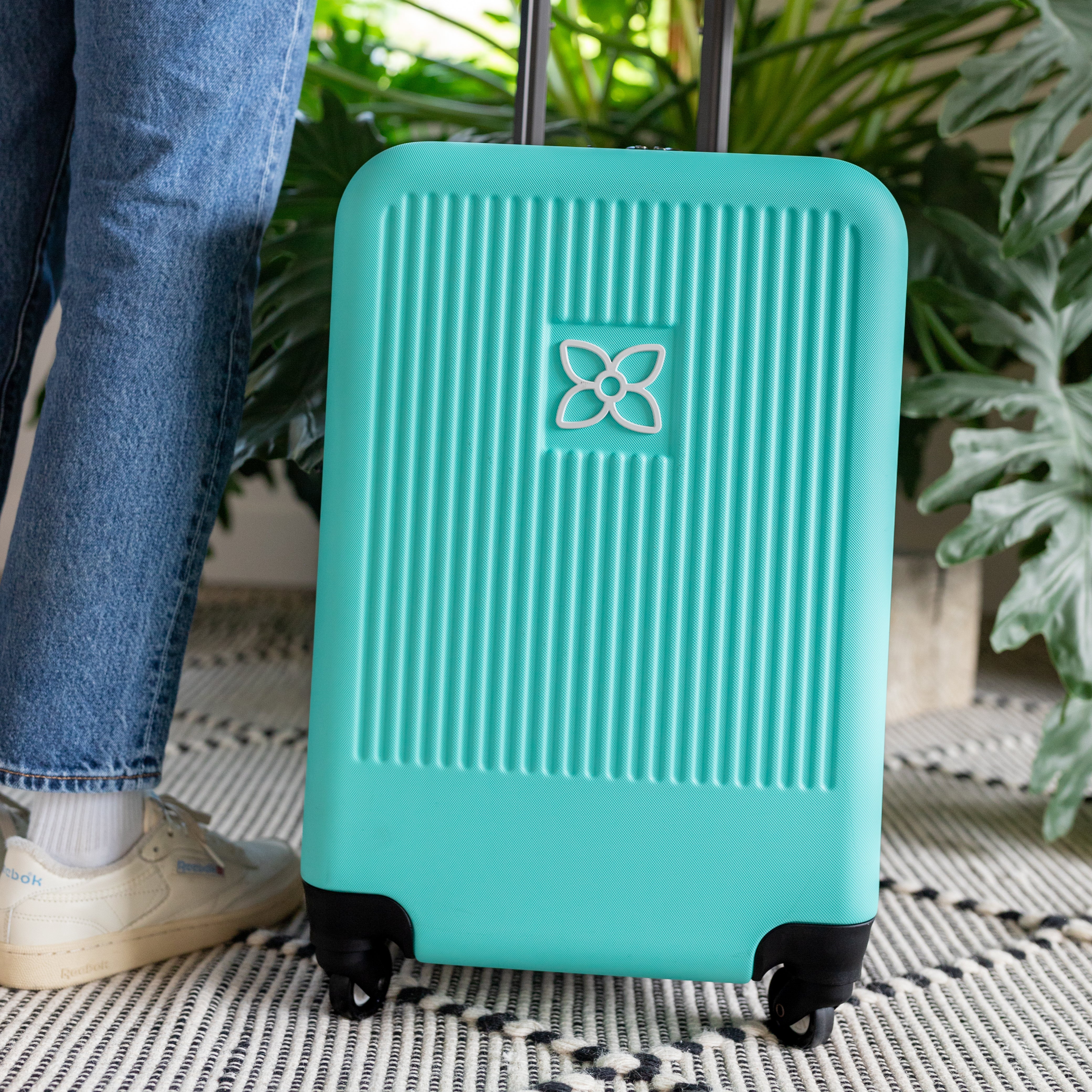 Sherpani hard-shell carry-on suitcase, the Meridian in Caribe. 