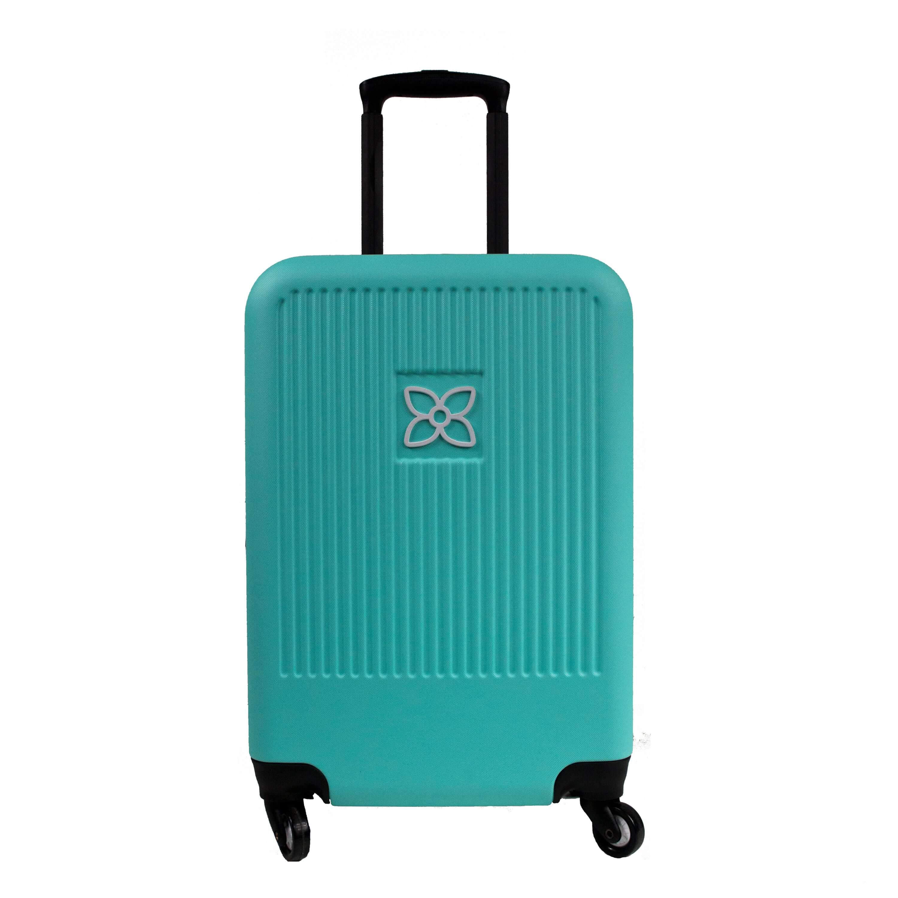 Flat front view of Sherpani hard-shell carry-on luggage, the Meridian in Caribe. Meridian features include a retractable luggage handle, uncrushable exterior, TSA-approved locking zippers and four 36-degree spinner wheels. The Caribe colorway is two-toned with the front of the suitcase in turquoise blue and the back in classic black. 