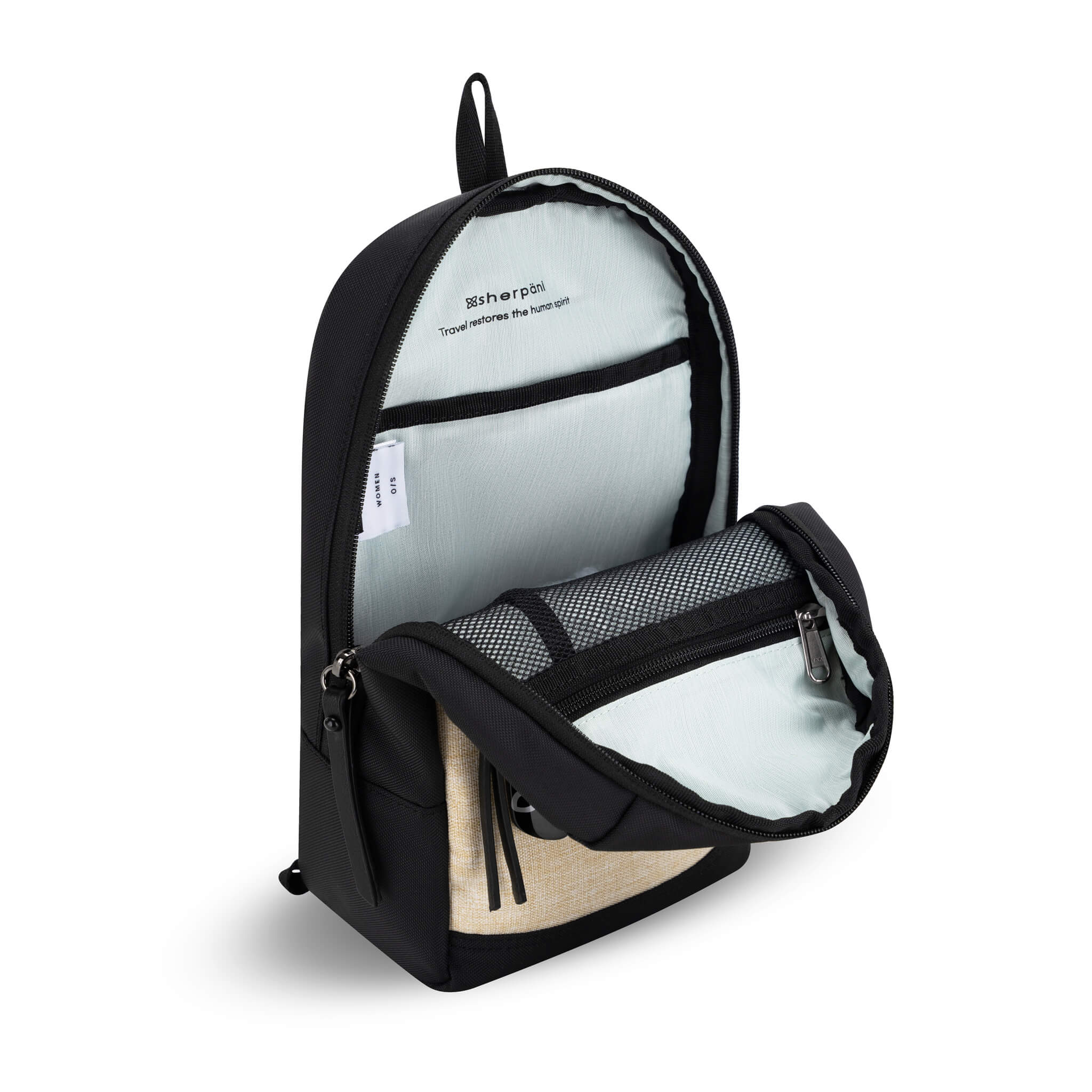 Inside view of Sherpani travel sling bag, the Metro. "Travel restores the human spirit" is printed on a light-colored interior. Features include zipper pockets made from see-through mesh for visibility. 