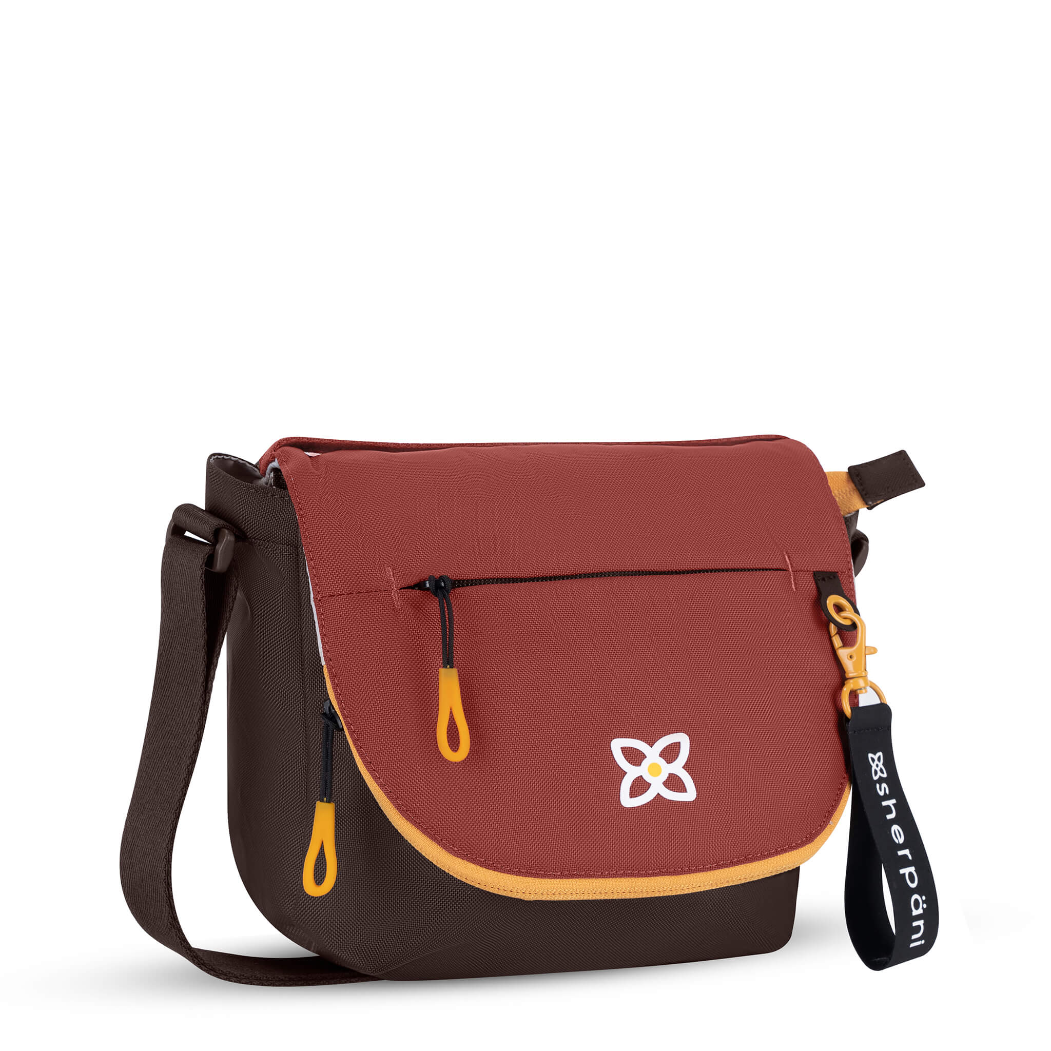 Angled front view of Sherpani messenger satchel bag, the Milli in Cider. Milli features include an adjustable crossbody strap, front zipper pocket, brimmed zipper pocket, detachable keychain, magnetic closure, RFID security and multiple internal pockets for organization. The Cider color is two-toned in burgundy and dark brown with yellow accents.
