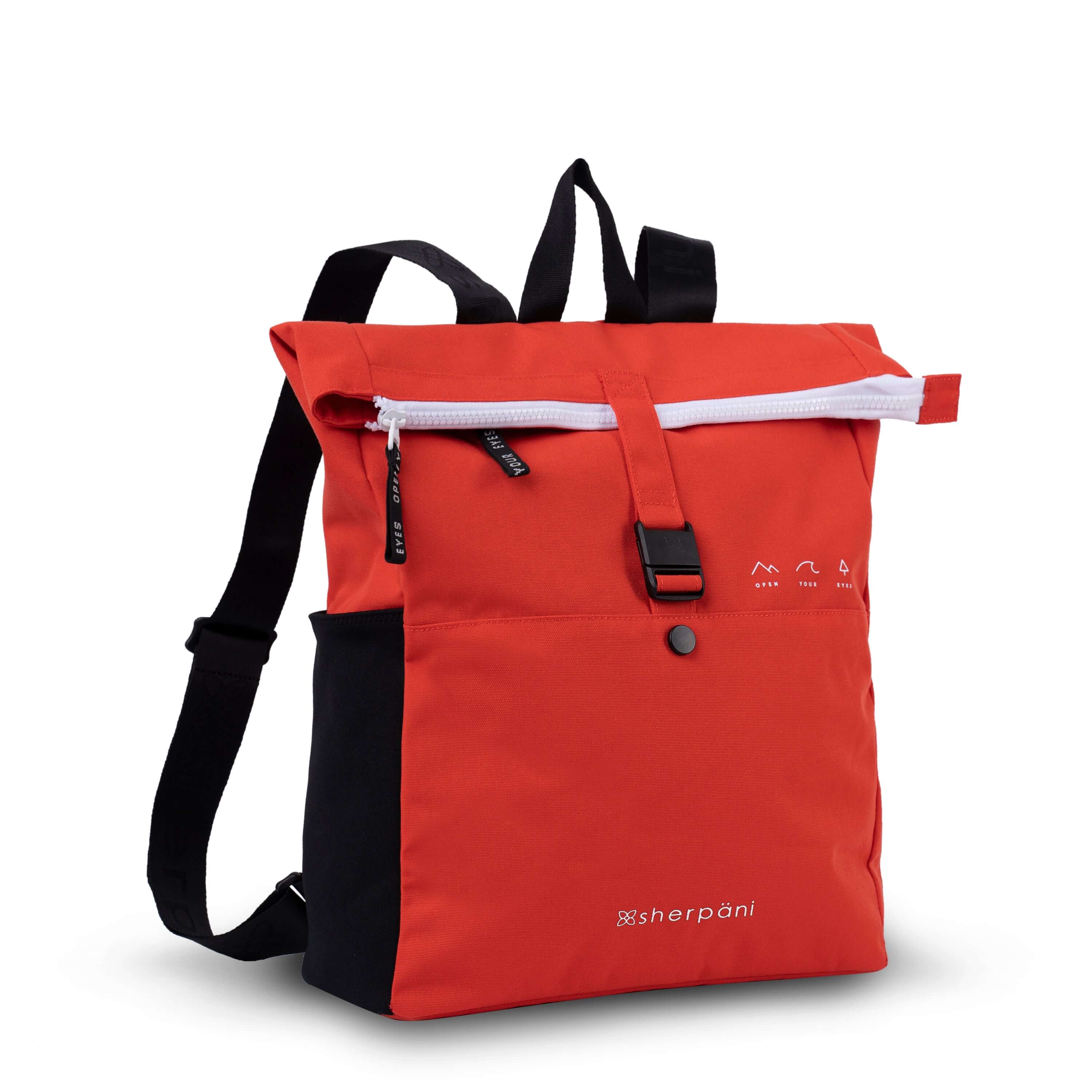 Angled front view of Sherpani backpack, the Miyako in Poppy. The bag is red in color with black accents. It features a magnetic buckle closure, adjustable backpack straps and an external water bottle holder. On the right side are small white graphics that depict mountains, a wave and a pine tree above white text that reads "Open Your Eyes."