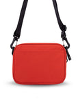 Back view of Sherpani crossbody, the Osaka in Poppy. There is an external pouch on the back of the bag.