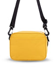 Back view of Sherpani crossbody, the Osaka in Sunflower. There is an external pouch on the back of the bag.