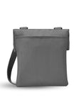 Back view of Sherpani crossbody, the Pica in Stone. The back of the bag features an external pouch.