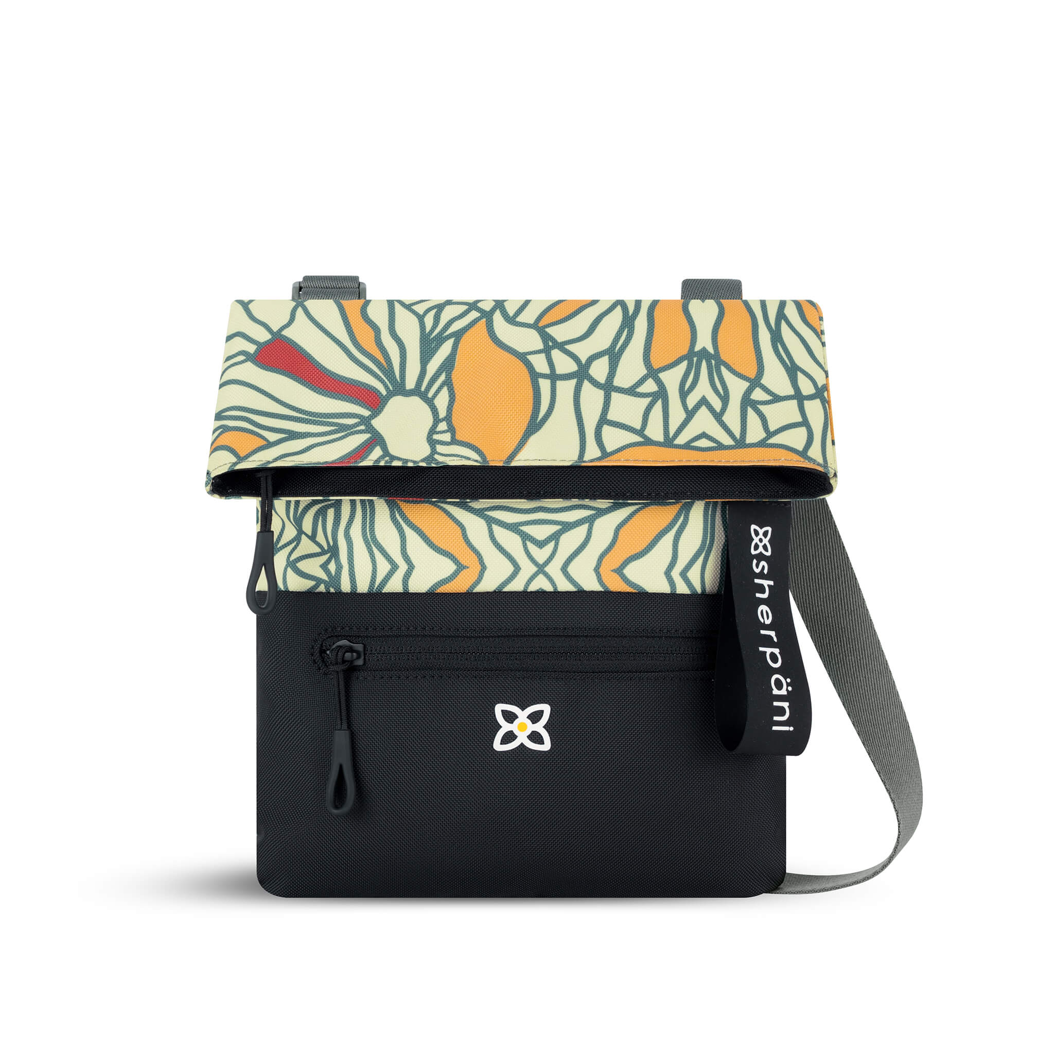 Flat front view of Sherpani fold over crossbody bag, the Pica in Fiori. Pica features include an adjustable crossbody strap, outside zipper pocket, back flap pocket, inside zipper pocket and slip pocket, detachable keychain and RFID protection. The Fiori colorway is two-toned in black and a floral pattern with red accents. 