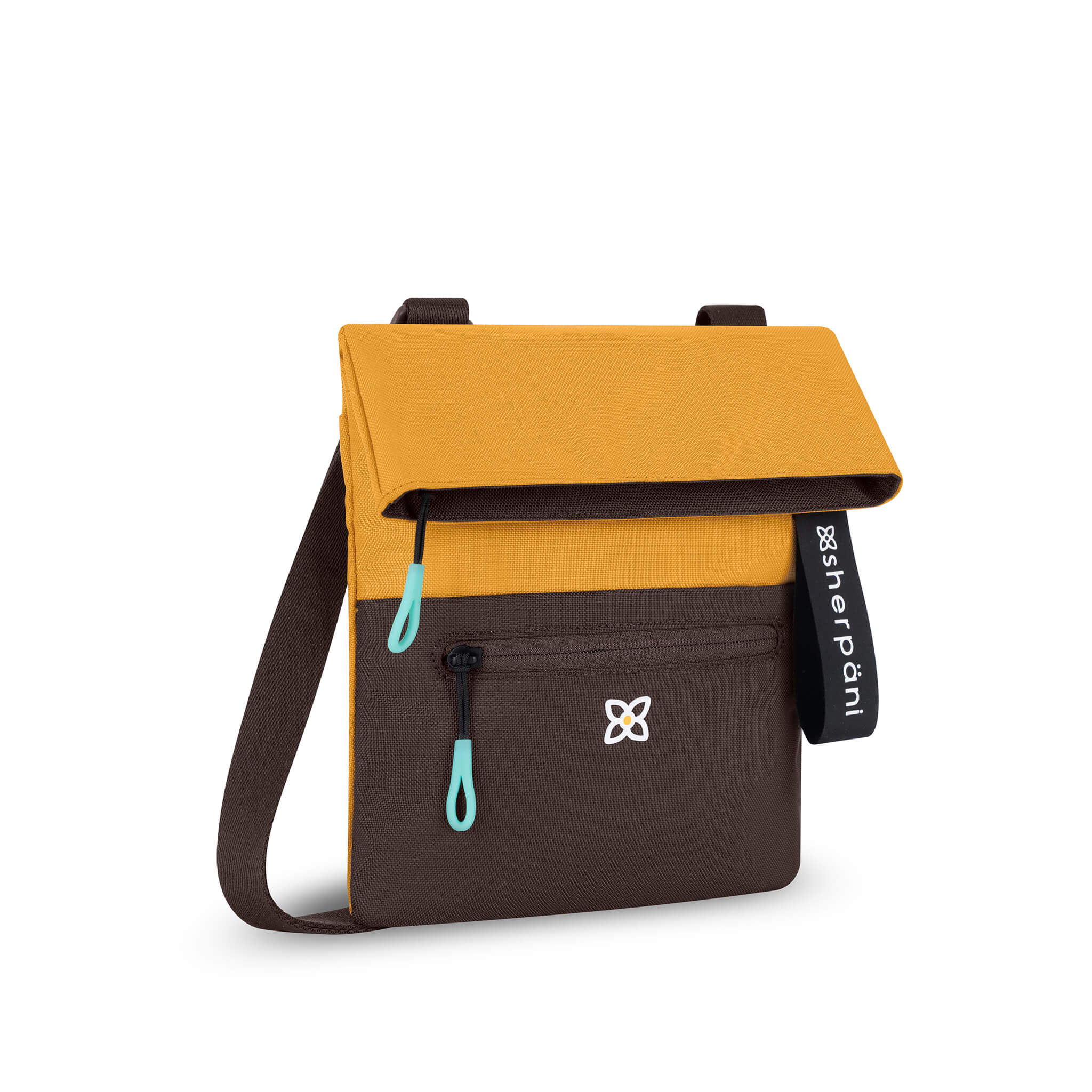 Angled front view of Sherpani fold over crossbody bag, the Pica in Sundial. Pica features include an adjustable crossbody strap, outside zipper pocket, back flap pocket, inside zipper pocket and slip pocket, detachable keychain and RFID protection. The Sundial coloway is two-toned in yellow and dark brown with turquoise accents. 