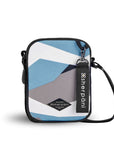 Flat front view of Sherpani crossbody, the Rogue in Summer Camo. The bag is two toned: the front is a camouflage pattern of light blue, gray and white, the back is black. The main zipper compartment features an easy-pull zipper accented in black. The bag has an adjustable crossbody strap. A branded Sherpani keychain is clipped to a fabric loop on the top right corner.