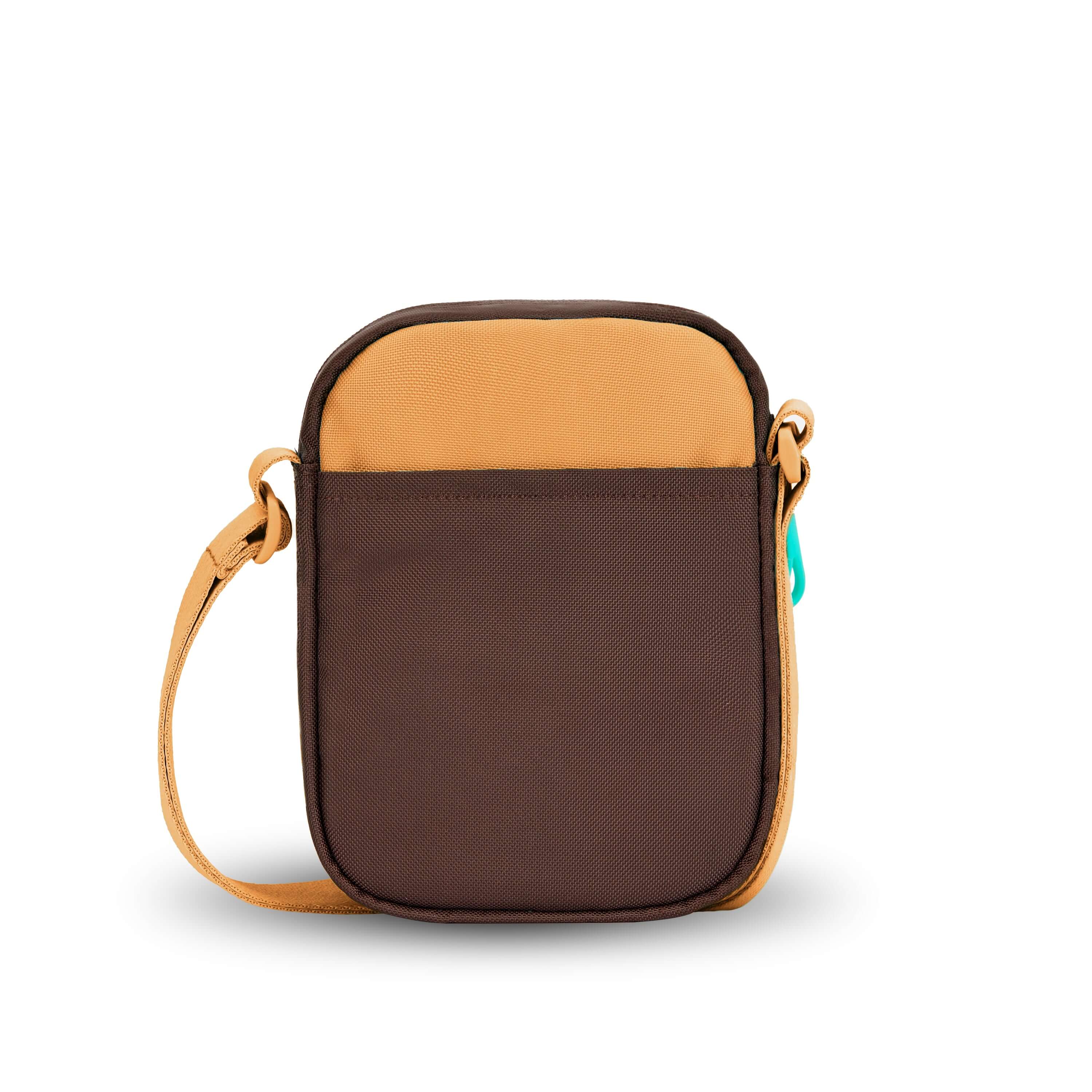 Back view of Sherpani crossbody, the Rogue in Sundial. The back features an external pouch.