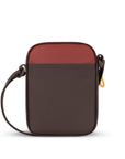 Back view of Sherpani mini crossbody purse, the Rogue in Cider. Rogue features include an adjustable crossbody strap, detachable keychain, compact design, minimalist bag, RFID protection and back slip pocket. The Cider color is two-toned in burgundy and dark brown with yellow accents.