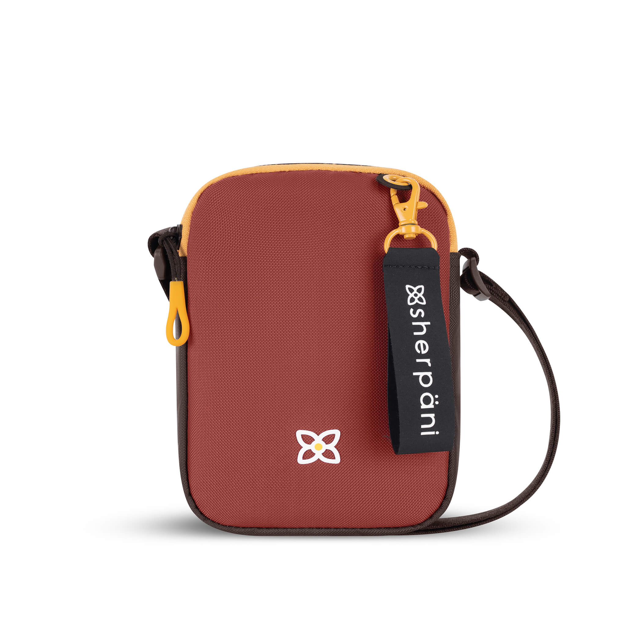 Flat front view of Sherpani mini crossbody purse, the Rogue in Cider. Rogue features include an adjustable crossbody strap, detachable keychain, compact design, minimalist bag and RFID protection. The Cider color is two-toned in burgundy and dark brown with yellow accents. 