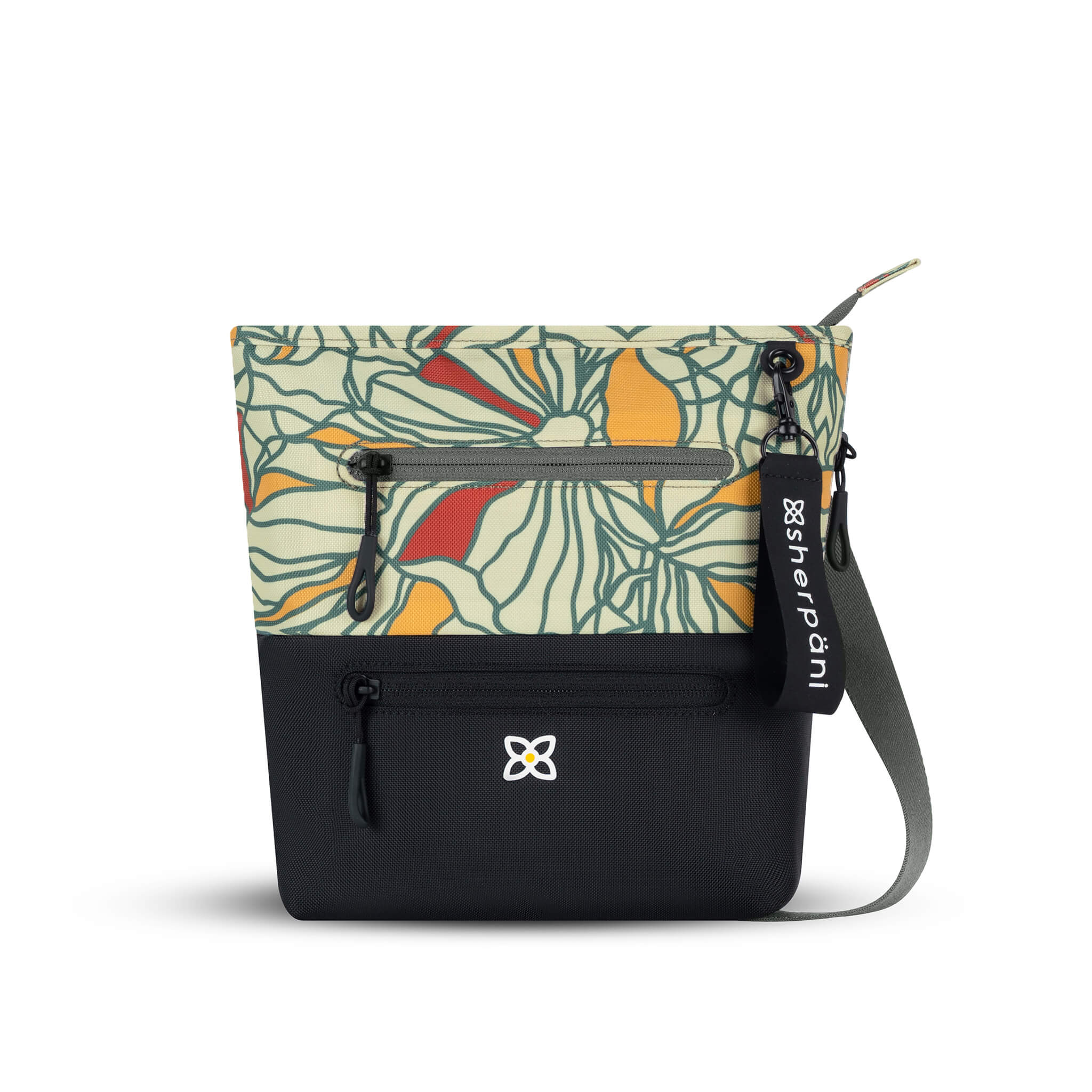 Flat front view of Sherpani crossbody travel bag, the Sadie in Fiori. Sadie features include two front zipper pockets, a discrete side pocket, detachable keychain, adjustable crossbody strap, back slip pocket and RFID blocking technology. The Fiori colorway is two-toned in black and a floral pattern with red accents. 