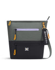 Flat front view of Sherpani crossbody travel bag, the Sadie in Juniper. Sadie features include two front zipper pockets, a discrete side pocket, detachable keychain, adjustable crossbody strap, back slip pocket and RFID blocking technology. The Juniper color is two-toned in black and gray and has accents in purple and yellow.