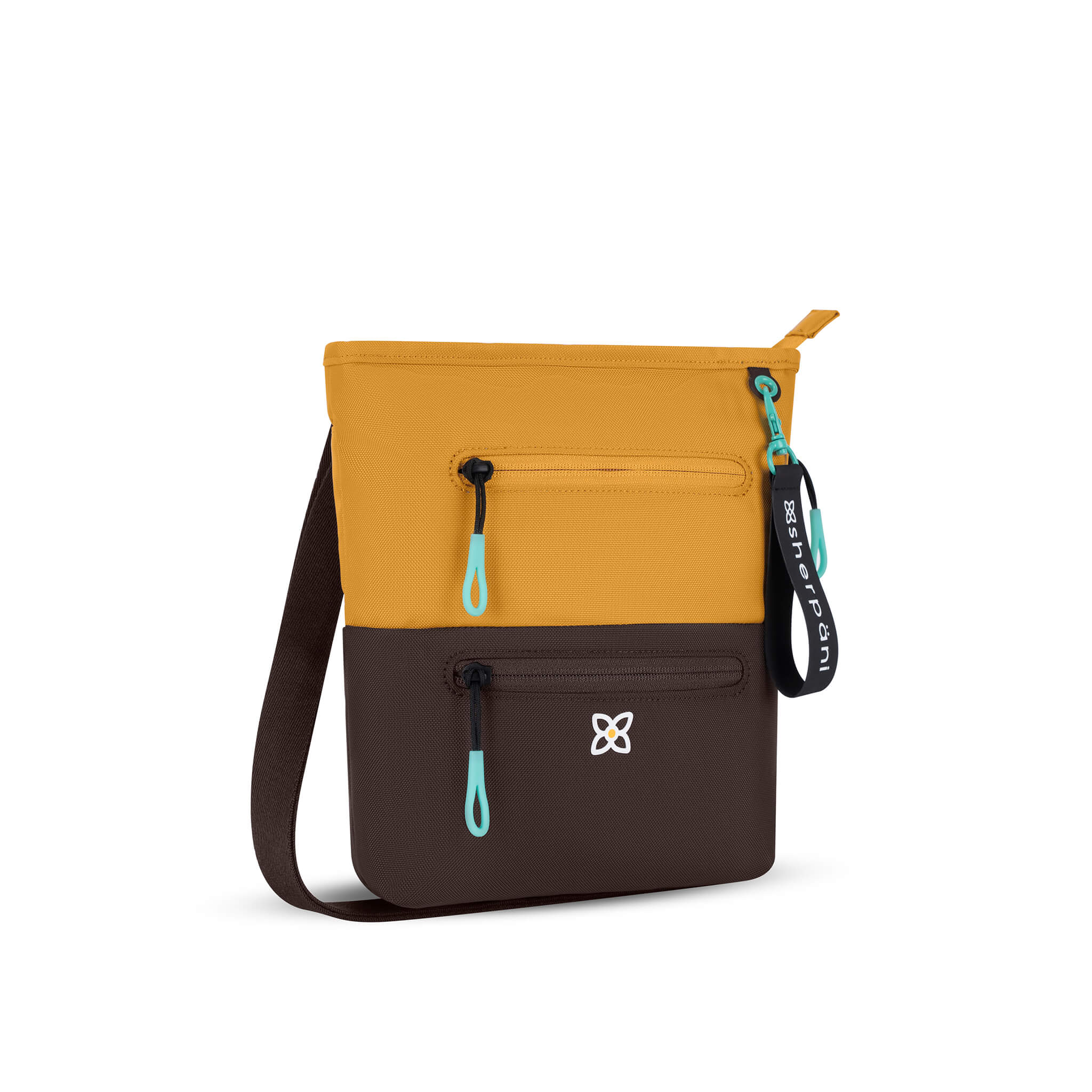 Angled front view of Sherpani crossbody travel bag, the Sadie in Sundial. Sadie features include two front zipper pockets, a discrete side pocket, detachable keychain, adjustable crossbody strap, back slip pocket and RFID blocking technology. The Sundial color is two-toned in yellow and dark brown with turquoise accents. 