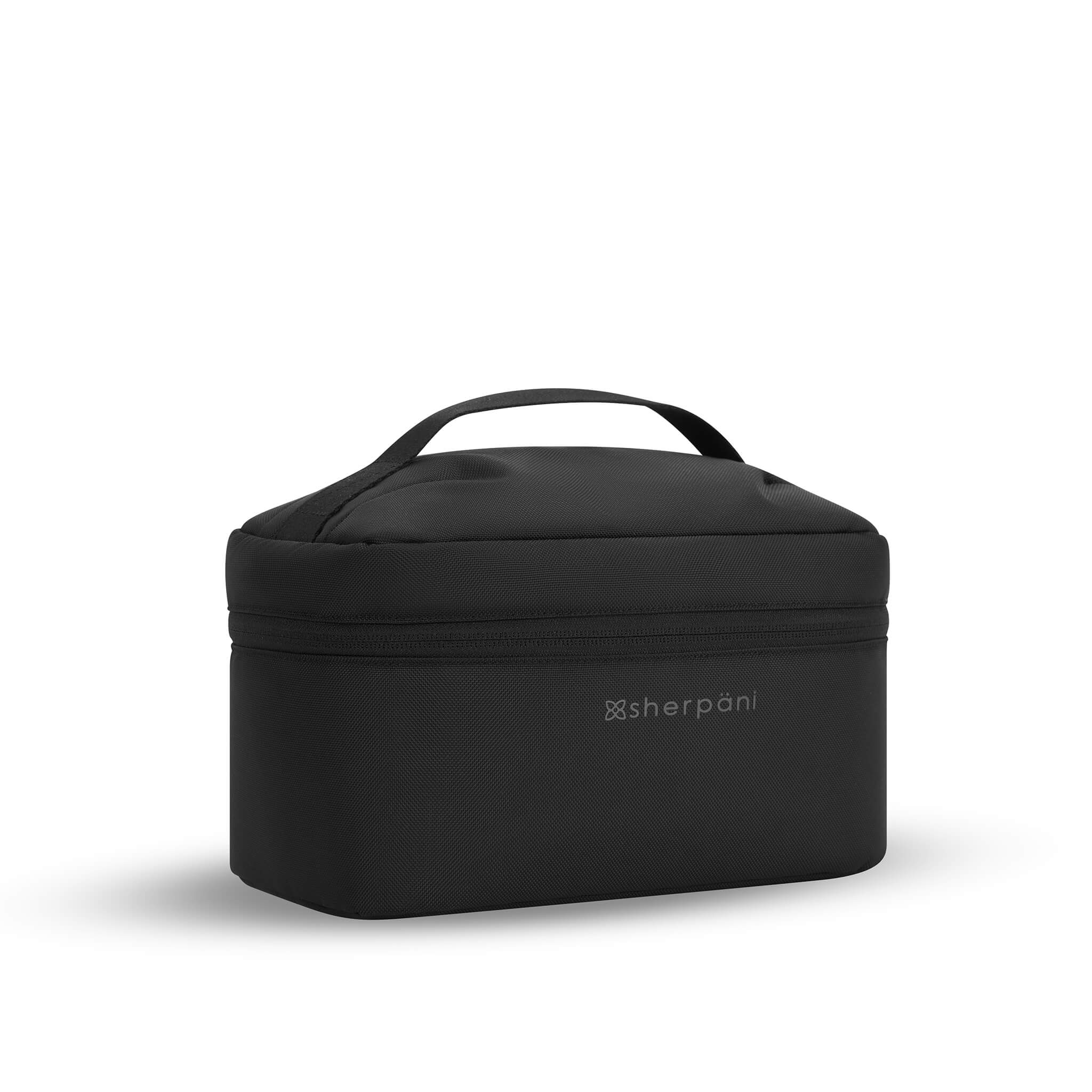 Angled front view of Sherpani travel accessory the Savannah in Carbon. The Savannah is a travel cosmetics case. 