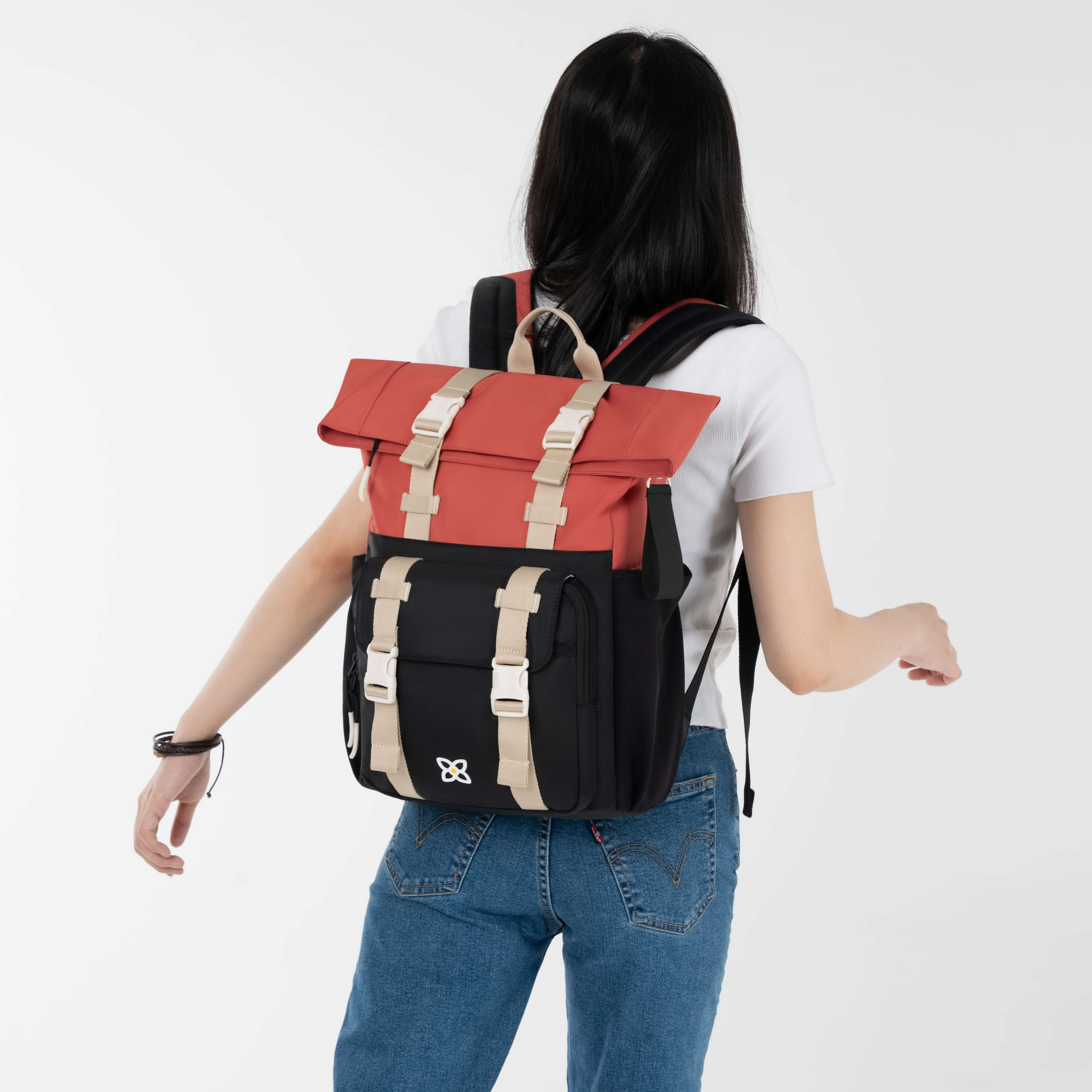 Back view of a model wearing Sherpani travel backpack for women, the Sedona in Reef. #color_Reef