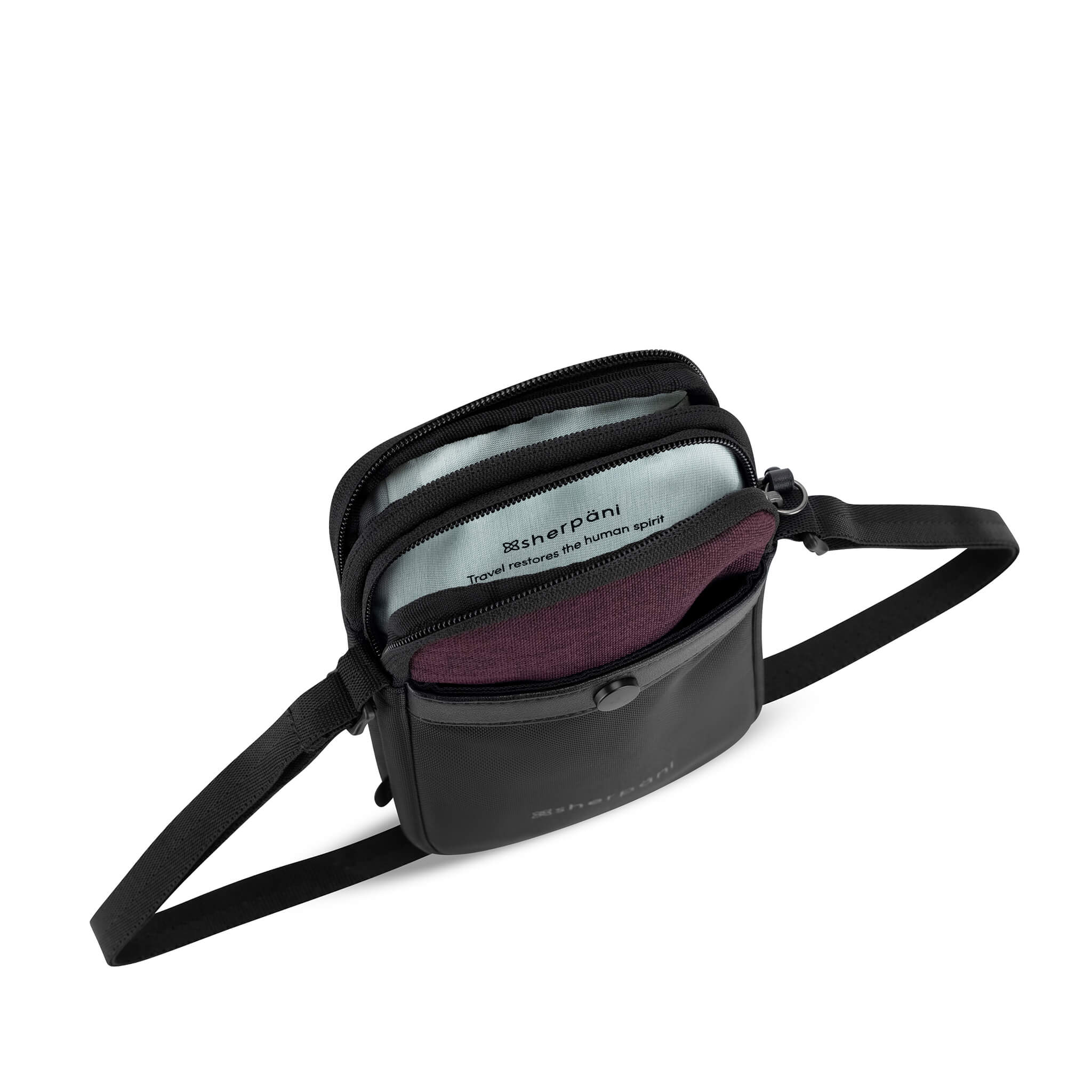 Top view of Sherpani crossbody wallet, the Simplicity in Merlot. The design includes zipper pockets and slip pockets for organization. 