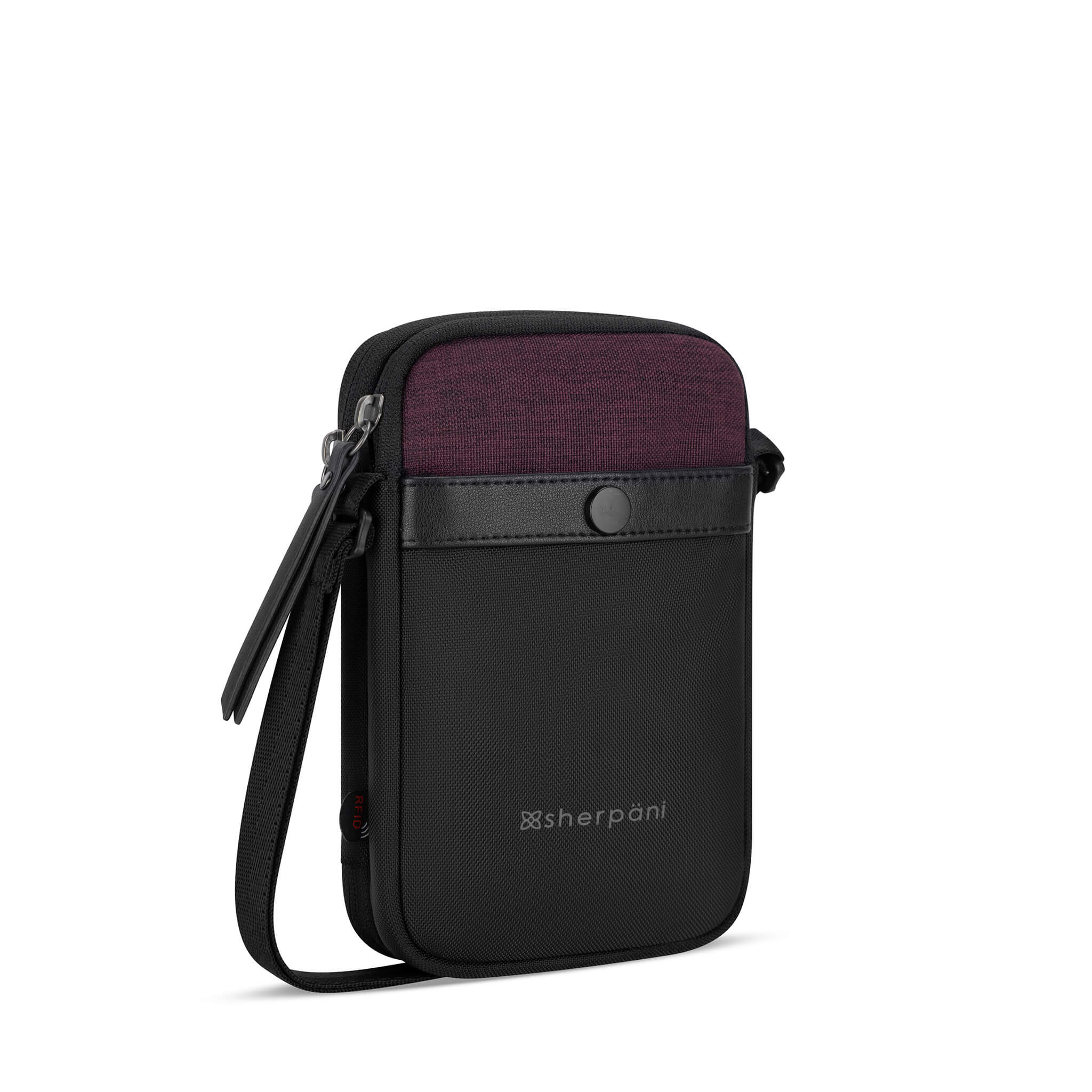 Angled front view of Sherpani crossbody wallet, the Simplicity in Merlot. The simple and minimalist bag includes anti-theft features and an adjustable crossbody strap. 