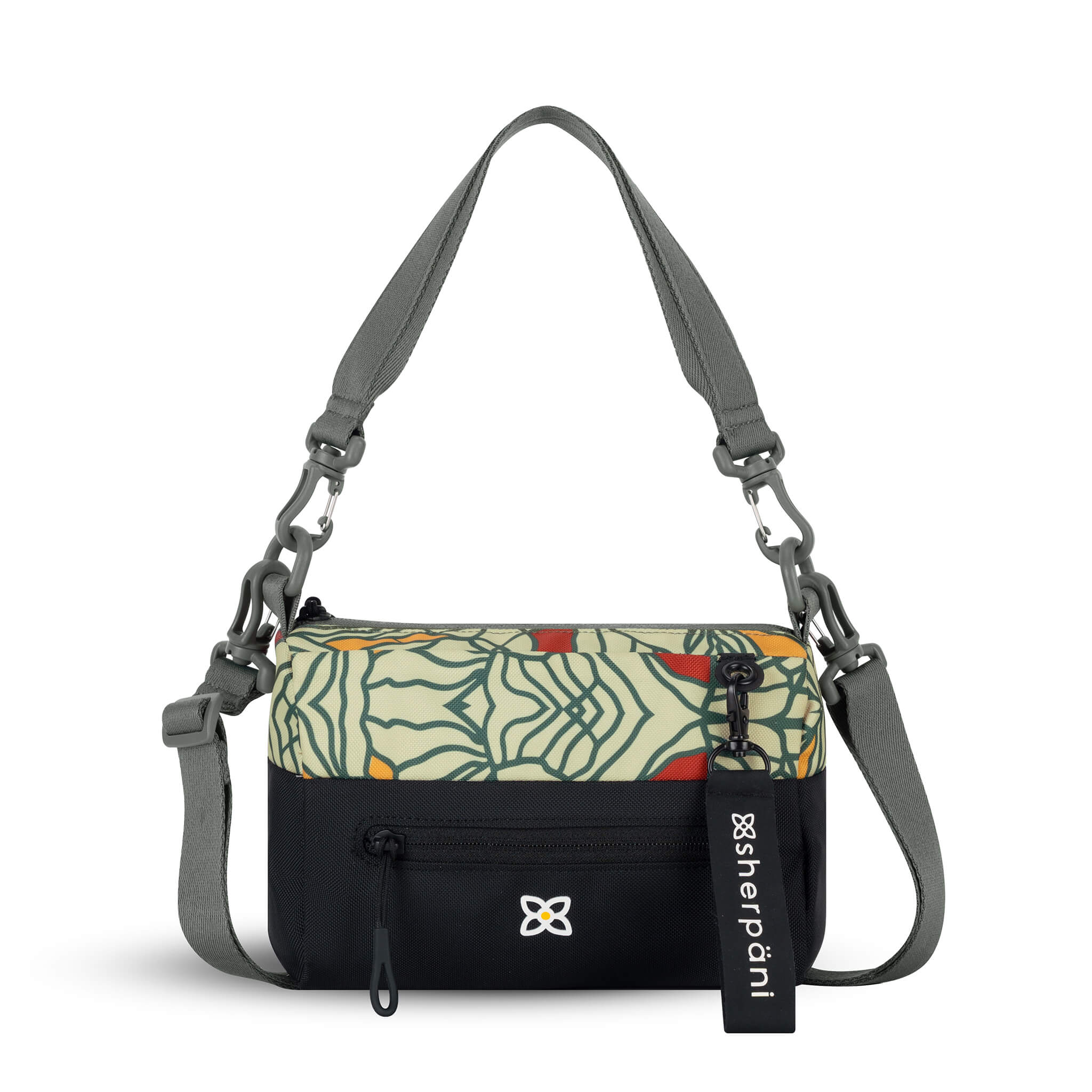 Flat front view of Sherpani mini shoulder bag, the Skye in Fiori. Skye features include RFID security, detachable keychain, outside zipper pocket, two inside zipper pockets and two removable straps: a short shoulder strap and a longer adjustable crossbody strap. The Fiori colorway is two-toned in black and a floral pattern with a neutral color palette.