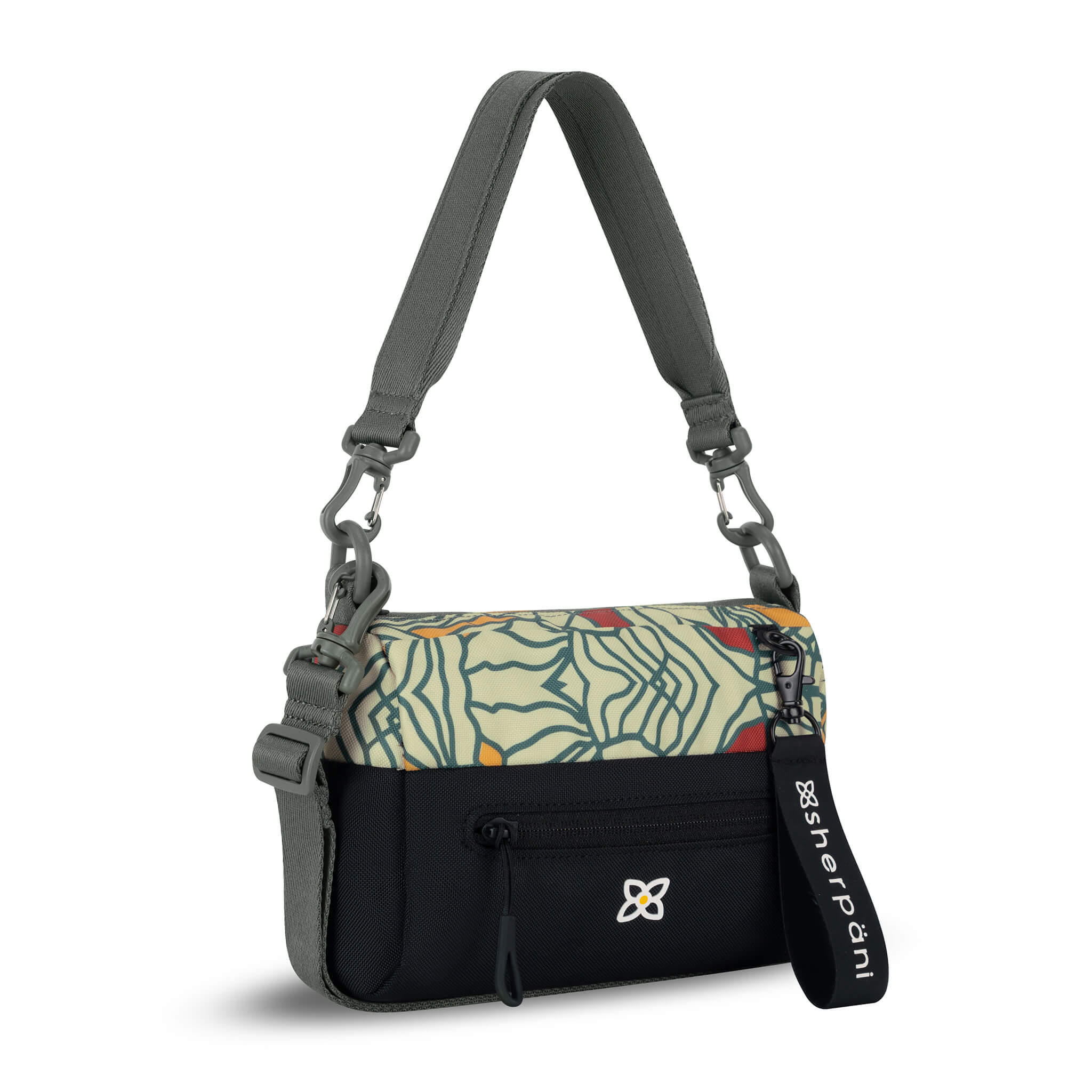 Angled front view of Sherpani mini shoulder bag, the Skye in Fiori. Skye features include RFID security, detachable keychain, outside zipper pocket, two inside zipper pockets and two removable straps: a short shoulder strap and a longer adjustable crossbody strap. The Fiori colorway is two-toned in black and a floral pattern with a neutral color palette.