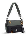 Angled front view of Sherpani mini shoulder bag, the Skye in Juniper. Skye features include RFID security, detachable keychain, outside zipper pocket, two inside zipper pockets and two removable straps: a short shoulder strap and a longer adjustable crossbody strap. The Juniper color is two-toned in gray and black with yellow accents.