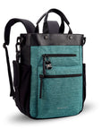 Angled front view of Sherpani's Anti-Theft bag, the Soleil AT in Teal, with vegan leather accents in black. On the front are two locking zipper compartments, a ReturnMe tag is clipped to the upper one. Two elastic water bottle holders sit on either side of the bag. It has padded backpack straps, short tote handles, and an adjustable/detachable crossbody strap. 