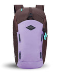 Flat front view of Sherpani backpack, the Switch in Lavender. The bag is two-toned in lavender and brown. Easy-pull zippers are accented in aqua. At the top is a metal buckle that connect to an external pouch on the front panel. It has adjustable and padded backpack straps. There is a daisy chain feature on the front panel.