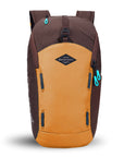 Flat front view of Sherpani backpack, the Switch in Sundial. The bag is two-toned in burnt yellow and brown. Easy-pull zippers are accented in aqua. At the top is a metal buckle that connect to an external pouch on the front panel. It has adjustable and padded backpack straps. There is a daisy chain feature on the front panel.