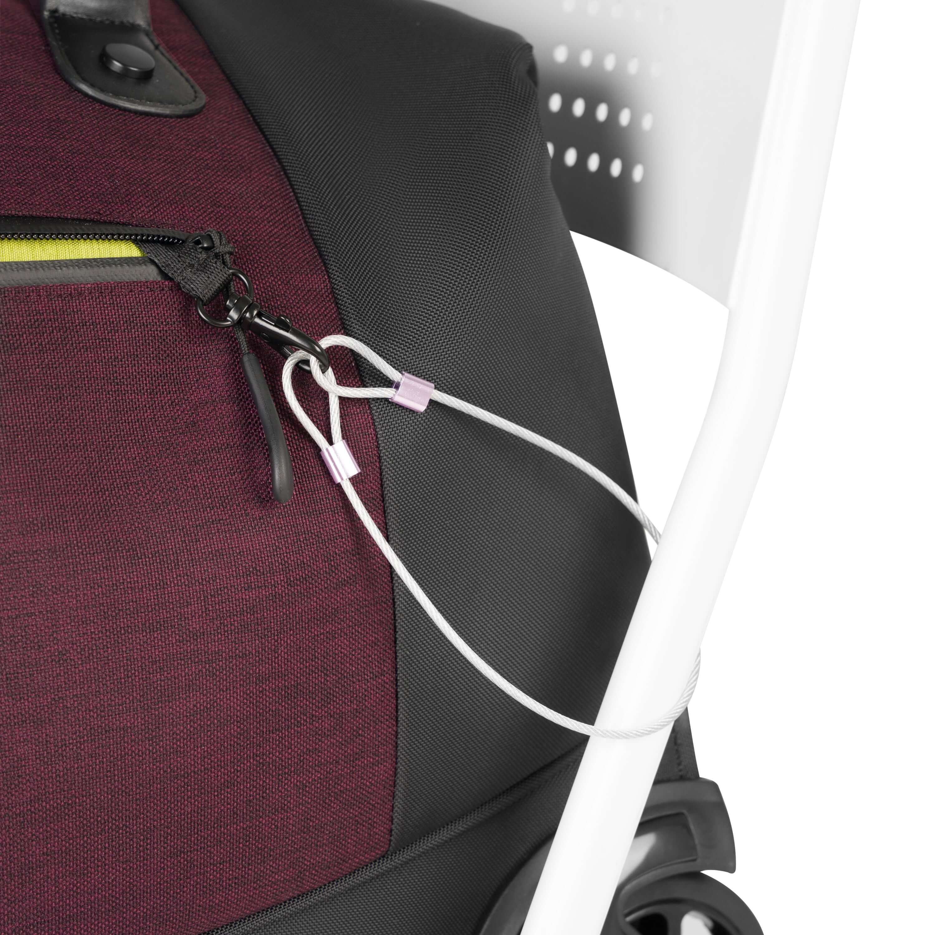 Close up view of the chair loop lock system securing Sherpani&#39;s Anti-Theft rolling duffle, the Trip in Merlot, to a chair.