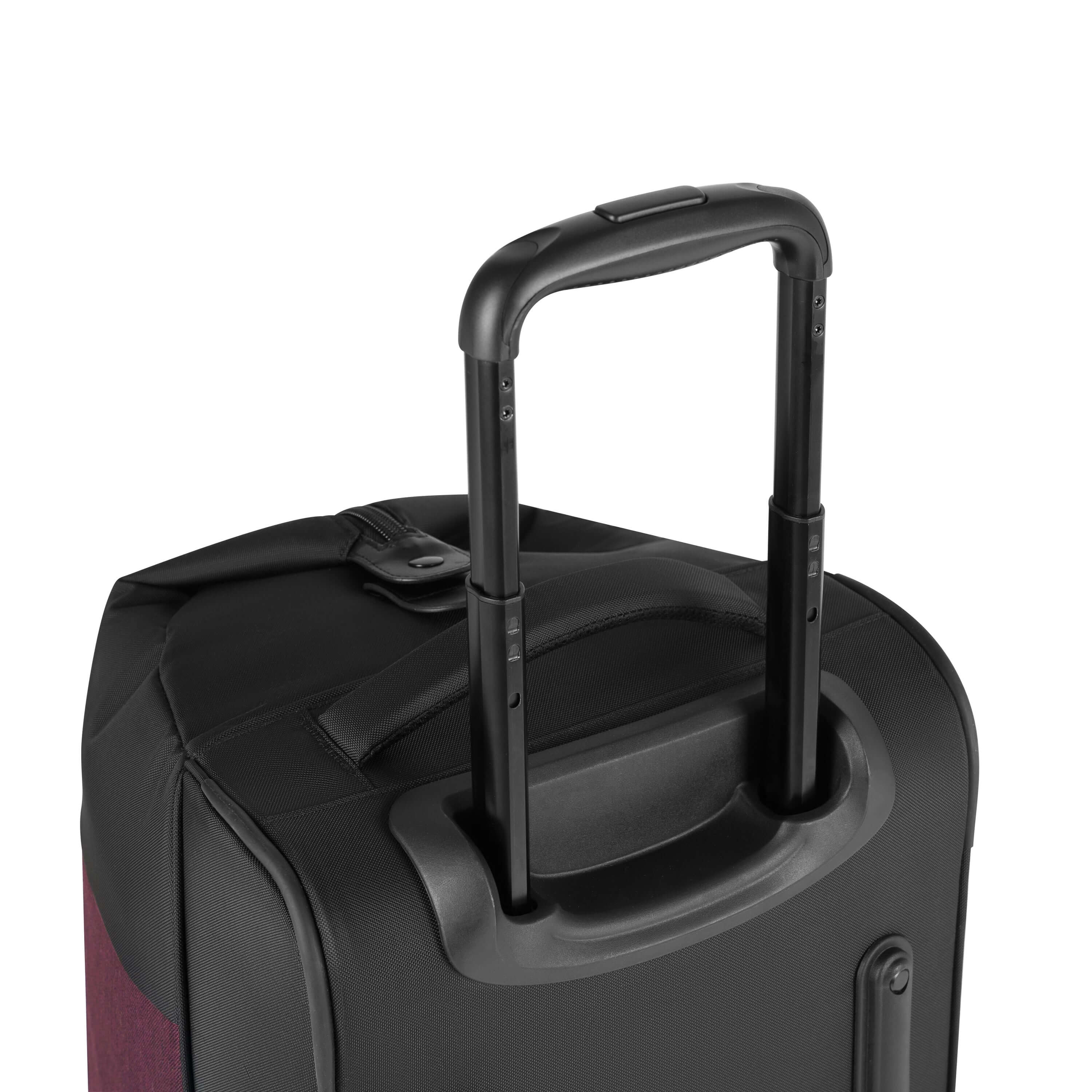 Close up view of retractable luggage handle on Sherpani&#39;s Anti-Theft rolling duffle the Tip in Merlot.