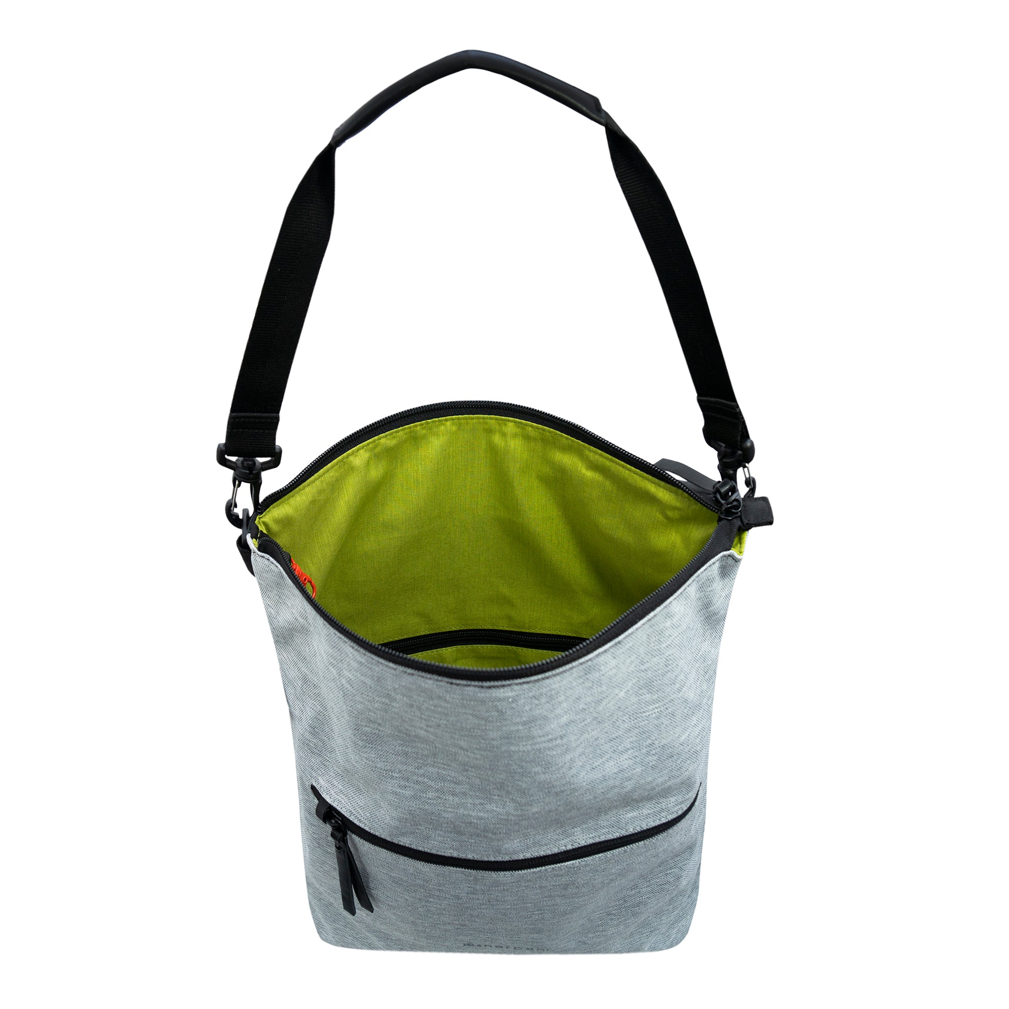 Top view of Sherpani’s Anti-Theft bag, the Vale AT in Sterling. The main zipper compartment is open to reveal a lime green interior with an internal zipper pocket. There is a red carabiner that acts as the zipper lock to the main compartment. The front features an external compartment with a locking zipper. A detachable tote strap is attached to the top of the bag. 