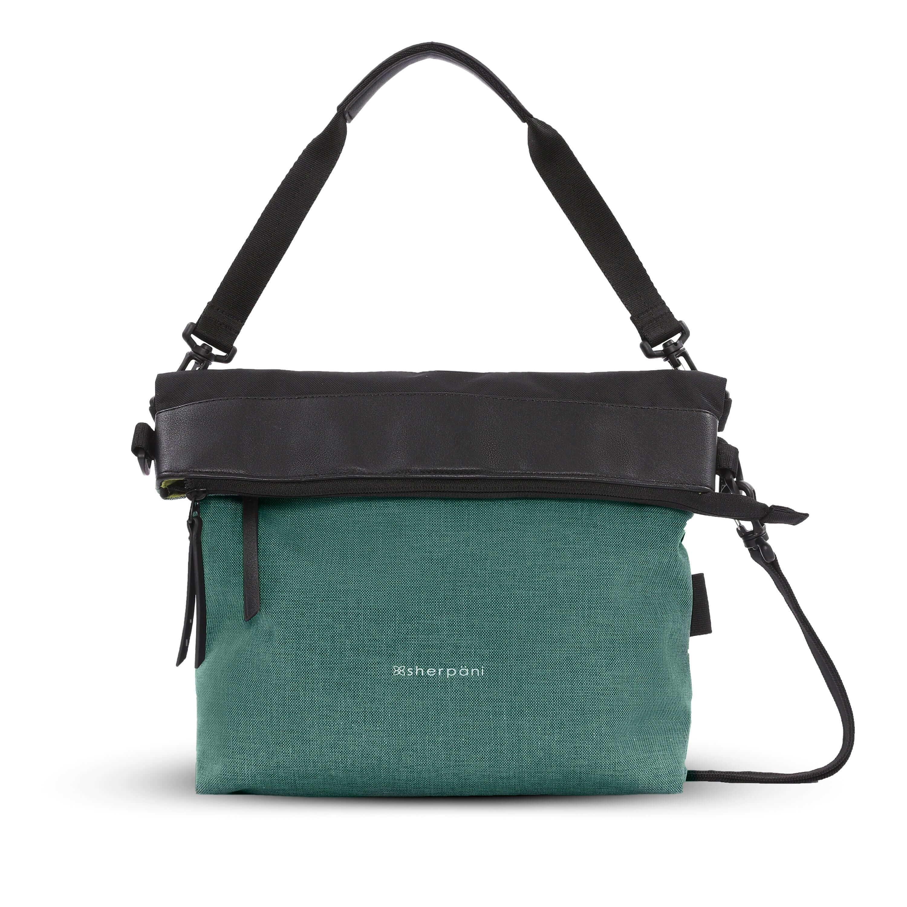 Flat front view of Sherpani's Anti-Theft bag, the Vale AT in Teal with vegan leather accents in black. The top is folded over creating a two-toned reversible overlap. It has an adjustable/detachable crossbody strap, and a second detachable strap fixed at a shorter length.