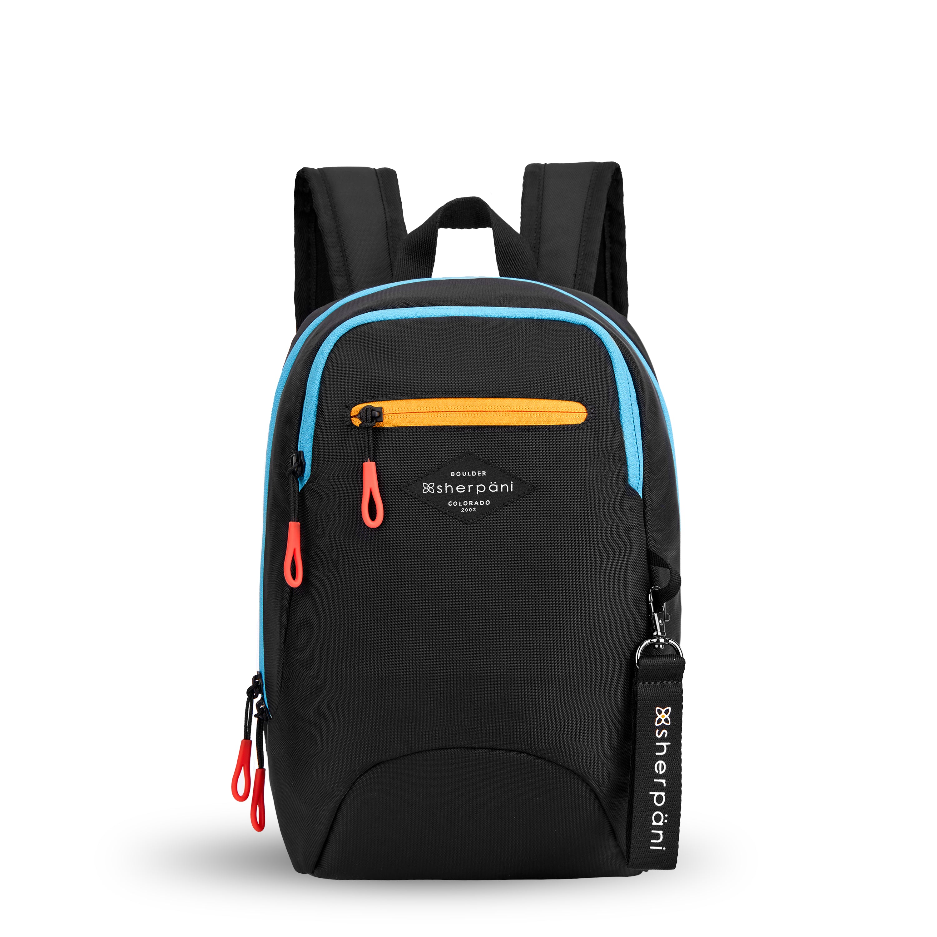 Flat front view of Sherpani mini backpack, the Vespa in Chromatic. The bag is mostly black and has accents in yellow and blue. It features easy-pull zippers accented in red. It has padded and adjustable backpack straps, as well as a tote handle for easy carrying. The bag has a main zipper compartment, a smaller secondary zipper compartment and an external zipper pocket on the front. A branded Sherpani keychain is clipped to a fabric loop on the front of the bag.