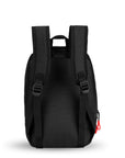 Back view of Sherpani mini backpack, the Vespa in Chromatic. The bag features padded and adjustable backpack straps, as well as a tote handle for easy carrying. The back of the bag is entirely black.