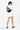 Model carries Sherpani two-way sling bag, the Wayfarer in St. Lucia, as a sling, on her back. #color_st-lucia