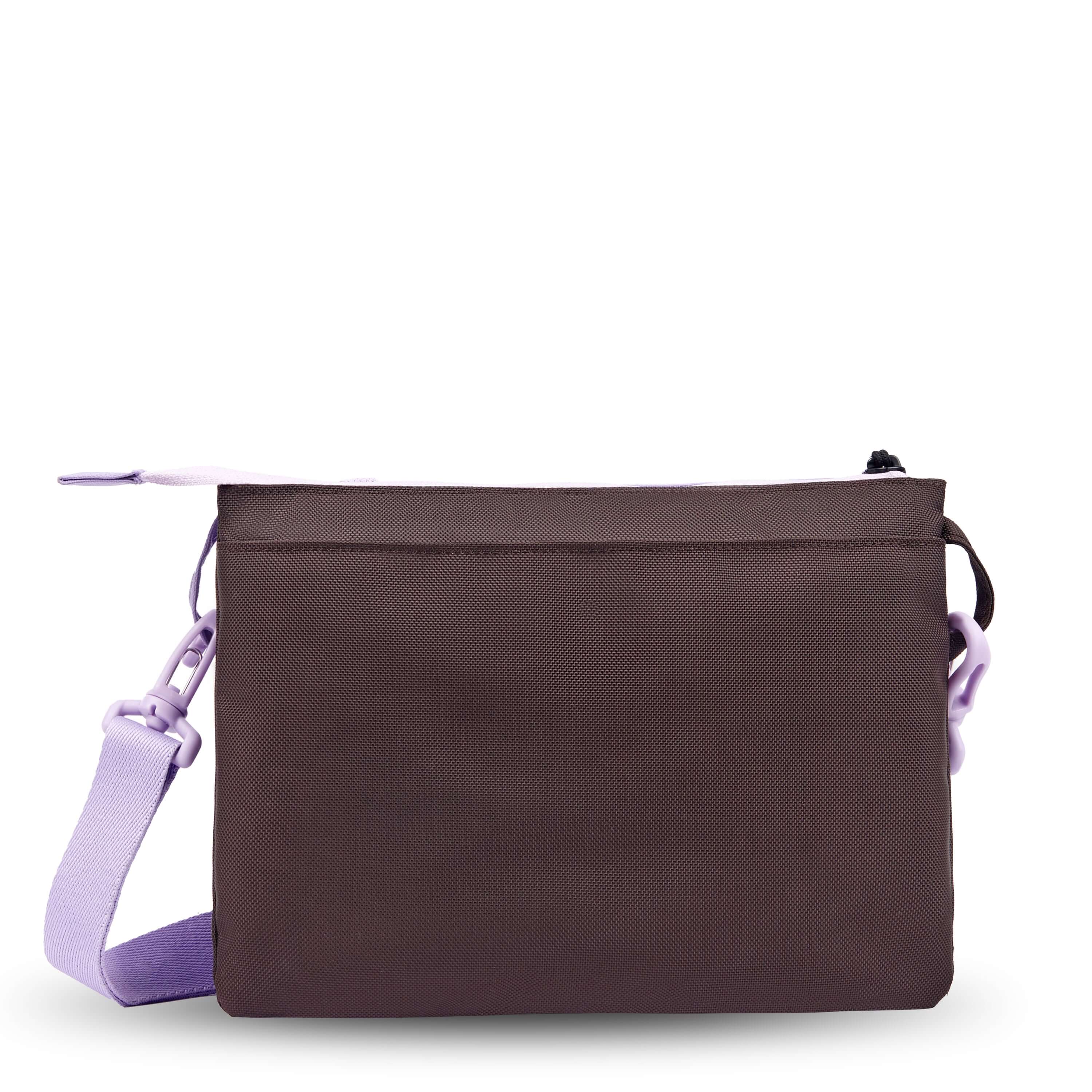 Back view of Sherpani crossbody, the Zoom in Lavender. The back of the bag is brown and features an external pouch.