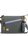 Flat front view of Sherpani small crossbody bag, the Zoom in Juniper. Special features of the Zoom include RFID protection, adjustable crossbody strap, removable strap, removable keychain, outside zipper pocket, internal divider, internal zipper pockets and back slip pocket. The Juniper color is two-toned in gray and black with accents in yellow and purple.
