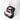 A Sherpani Camden Ciao Ultimate Backpack, 3/4 view showing the inside filled with a laptop, smartphone, sunglasses, notebooks, passport, and essentials on a white background. #color_ciao-print