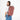 A woman wearing a Sherpani Camden Desert Pink Ultimate Backpack on her back against white background.  #color_desert-pink