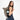 Woman wearing a Sherpani Sedona Dune Backpack on her back against white background. #color_dune-tan