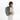 A woman wearing a Sherpani Solstice Houndstooth Anti-Theft Travel Backpack on her back against a white background.   #color_houndstooth-print