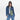 Woman wearing a Sherpani Izzie Olivine Water Bottle Crossbody on white background. #color_olivine-green