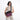 Woman wearing a Sherpani Vale Smoky Orchid Anti-theft Reversible Crossbody against white background. #color_smoky-orchid-pink