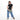Woman wearing a Sherpani Zoom Oiivne Slim RFID Crossbody against white background. #color_olivine-green